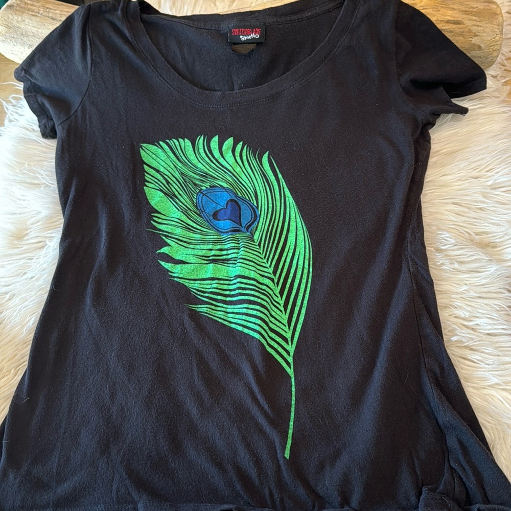 Switchblade stiletto peacock tank top